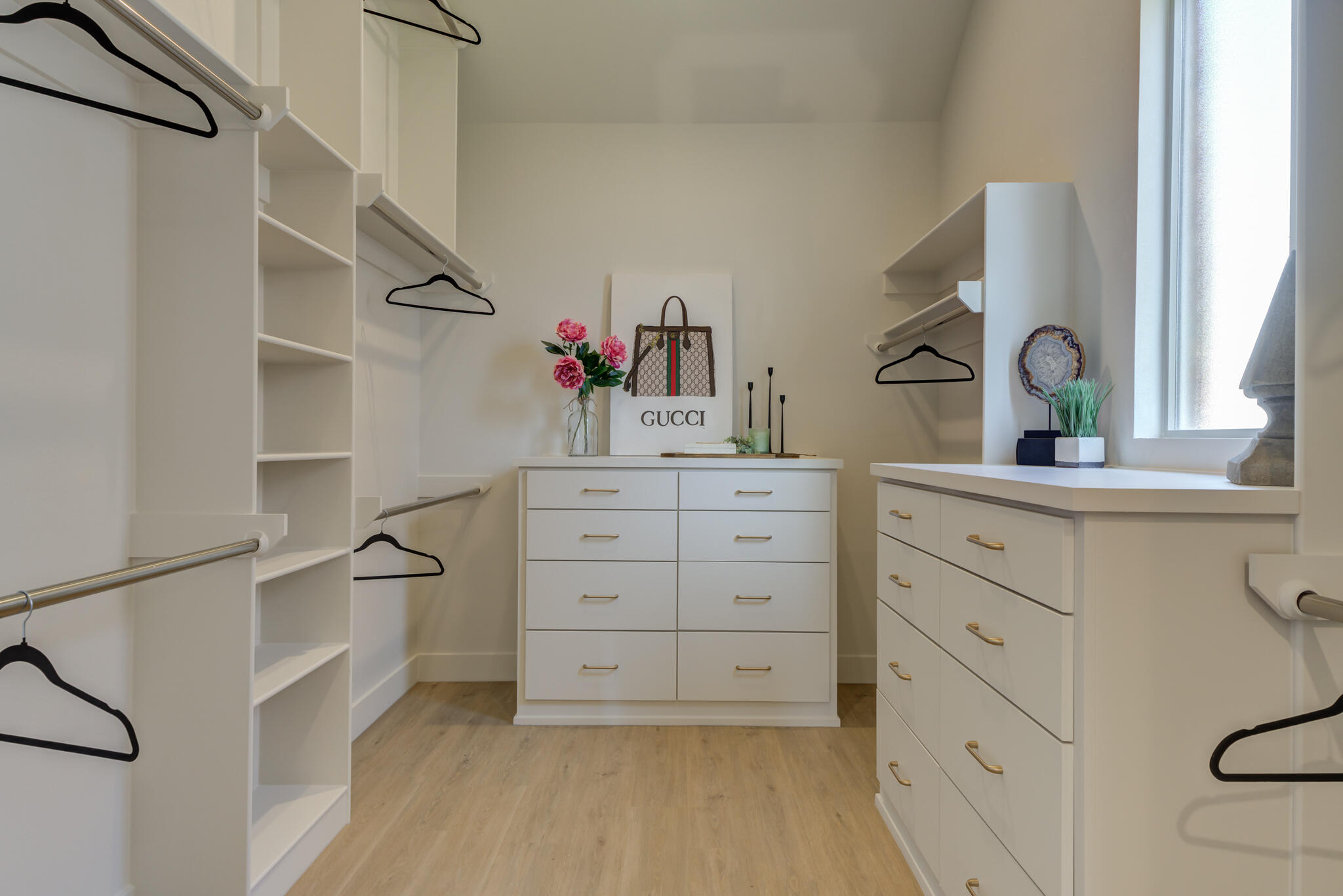 3809 126th Street Lubbock, TX 79423 - Photo 42 of 58 a room with a cabinets and a dresser