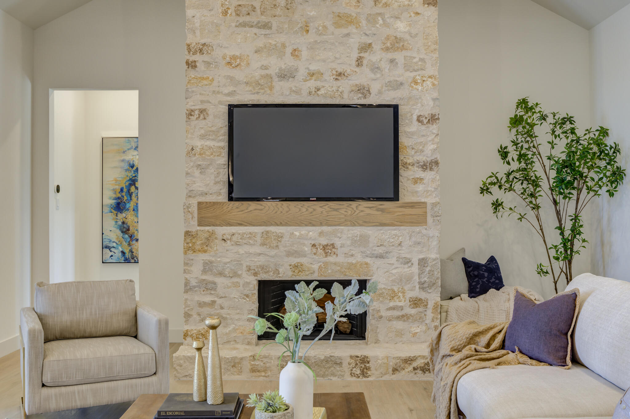3809 126th Street Lubbock, TX 79423 - Photo 8 of 58 a living room with furniture and a fireplace