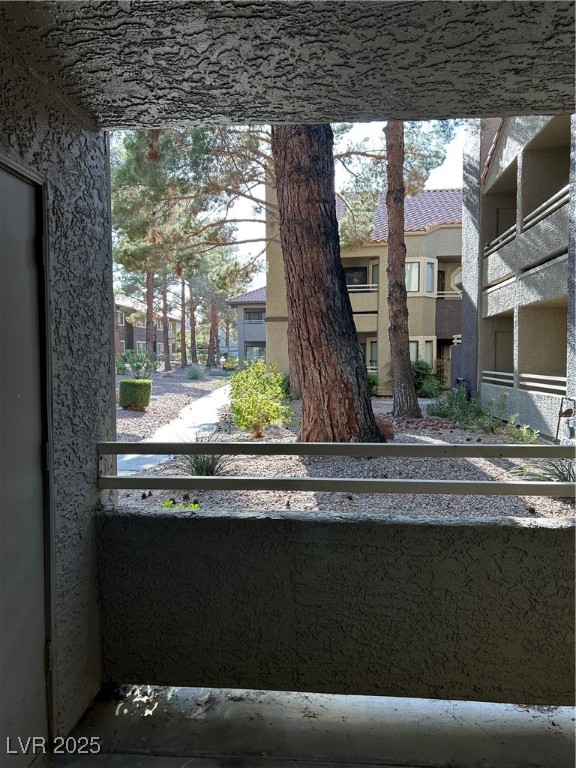5044 South Rainbow Boulevard, Unit 106 Las Vegas, NV 89118 - Photo 14 of 18 Exterior view of a residential view and stucco siding