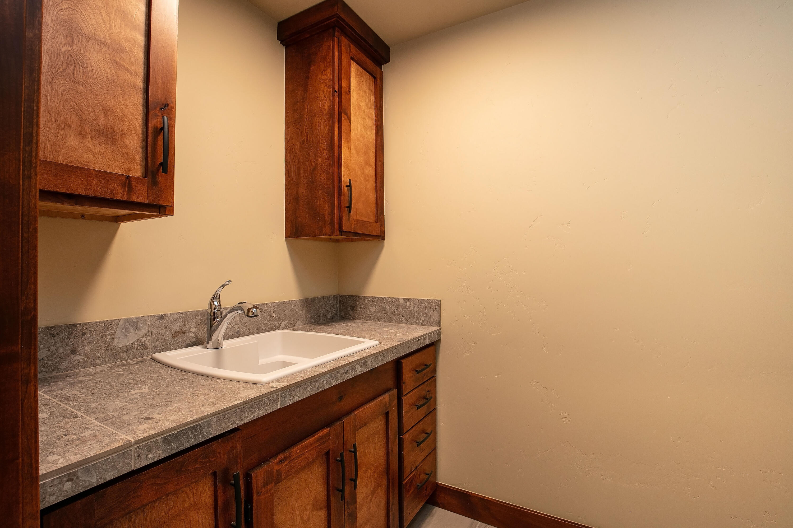 1472 Northeast Hudspeth Road Prineville, OR 97754 - Photo 22 of 26 a bathroom with a sink and a mirror
