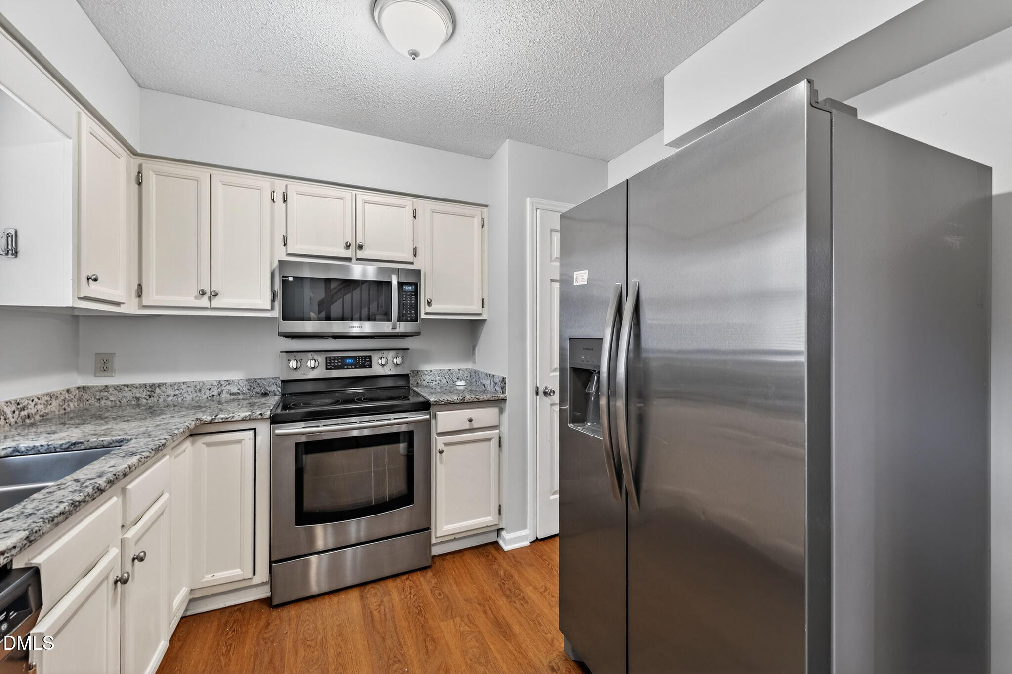 4131 Kaplan Drive Raleigh, NC 27606 - Photo 6 of 34 13_4131_Kaplan_Dr_Raleigh_NC_27606-Kitch