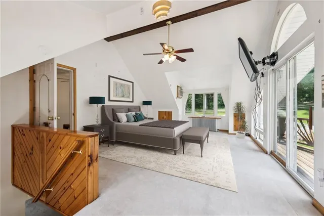 a view of balcony with wooden floor and fence