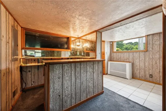 a view of a backyard with sitting area