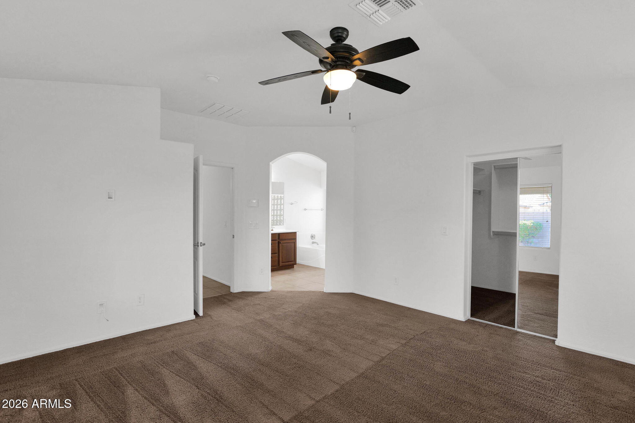 2730 East Dry Wood Road Phoenix, AZ 85024 - Photo 13 of 33 wooden floor in an empty room with a window