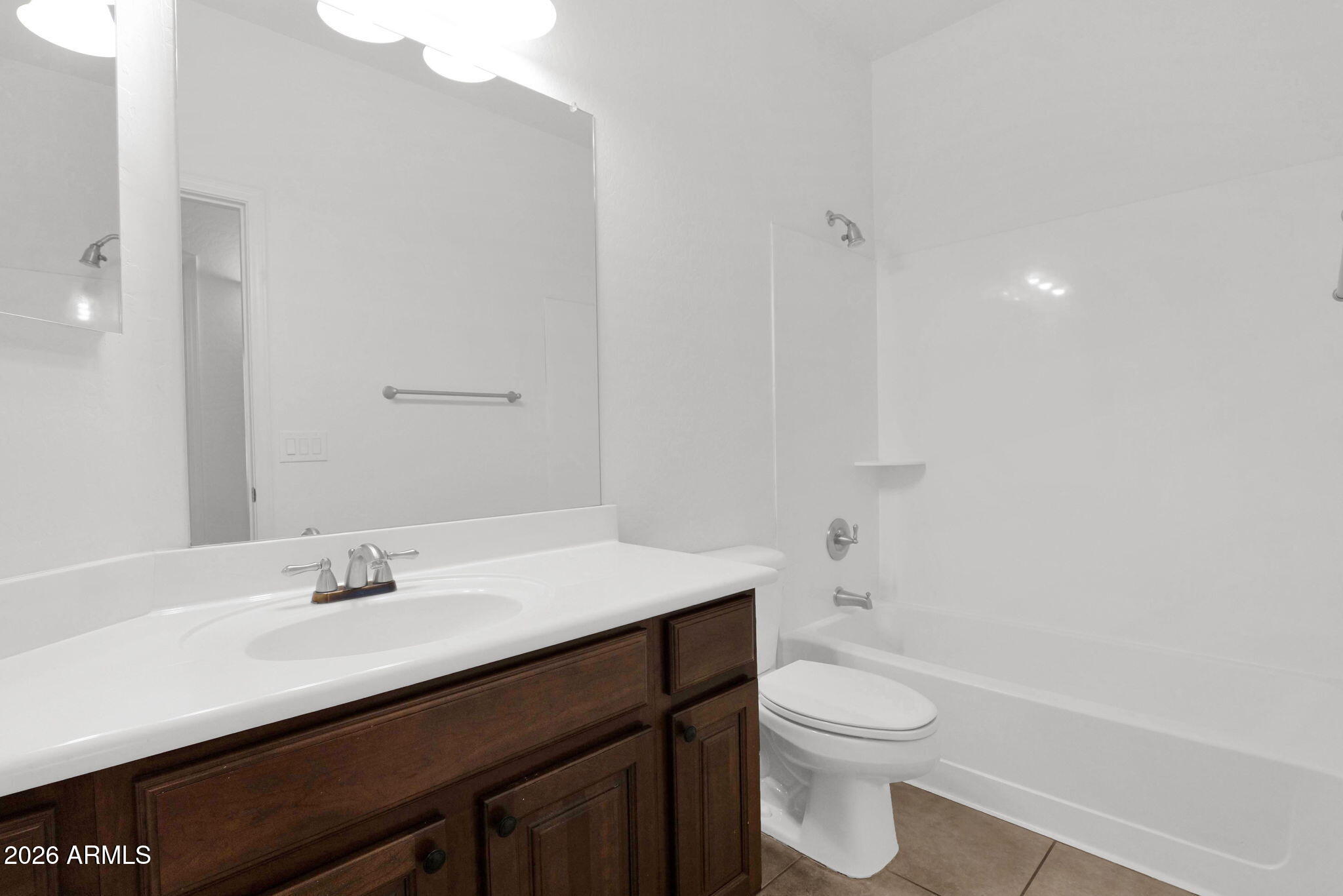 2730 East Dry Wood Road Phoenix, AZ 85024 - Photo 19 of 33 a bathroom with a sink a toilet and shower