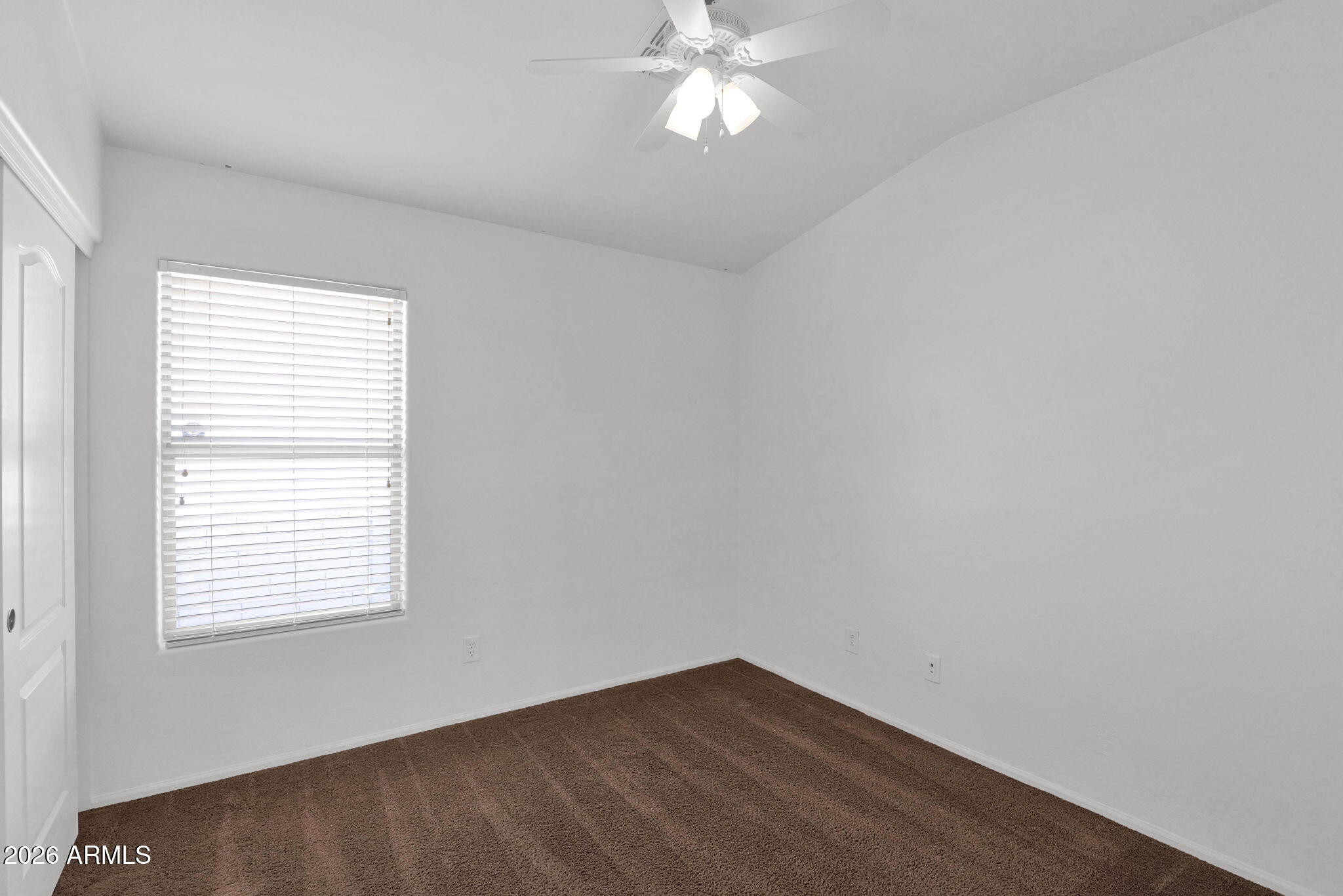 2730 East Dry Wood Road Phoenix, AZ 85024 - Photo 20 of 33 an empty room with a window