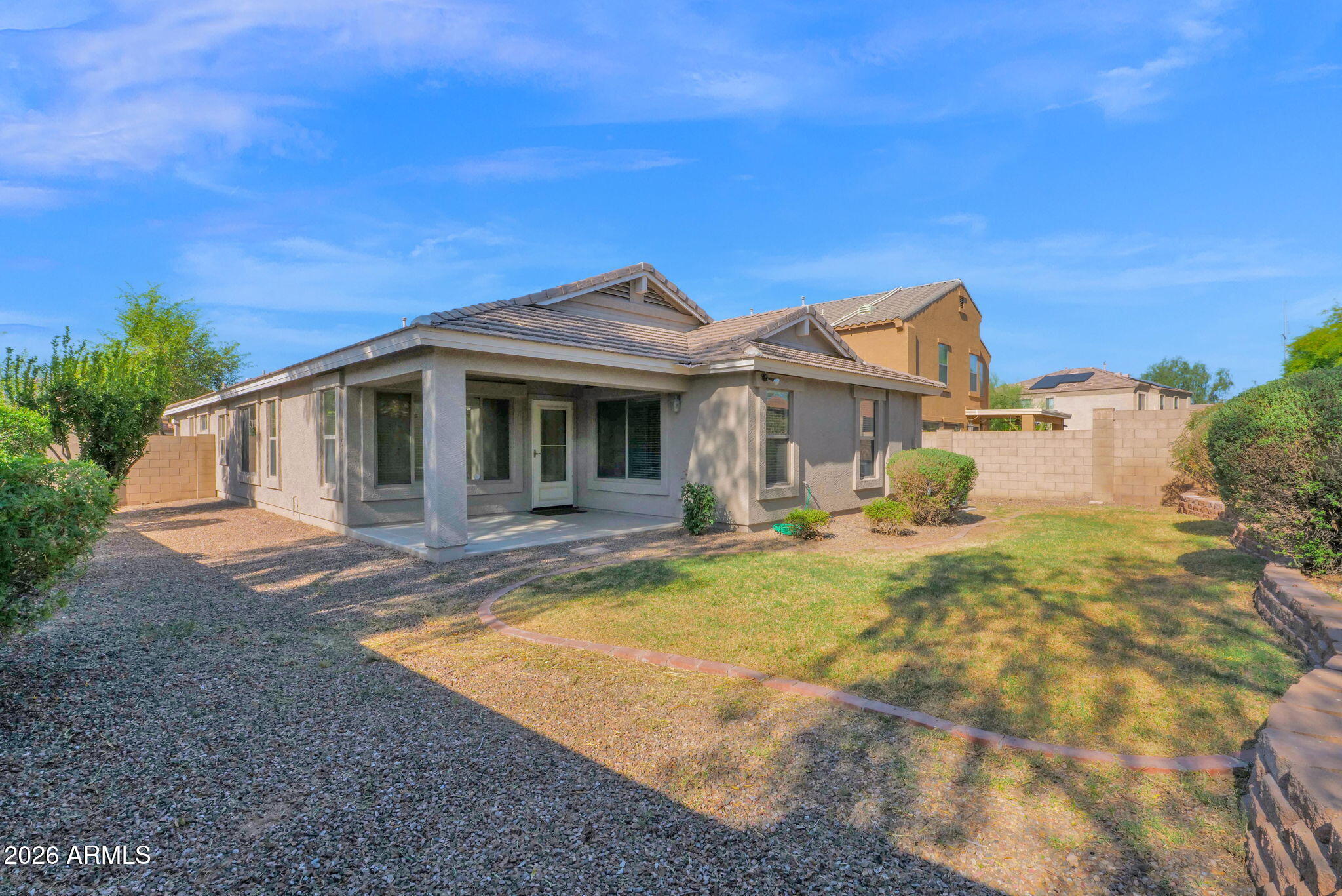 2730 East Dry Wood Road Phoenix, AZ 85024 - Photo 2 of 33 a front view of a house with swimming pool