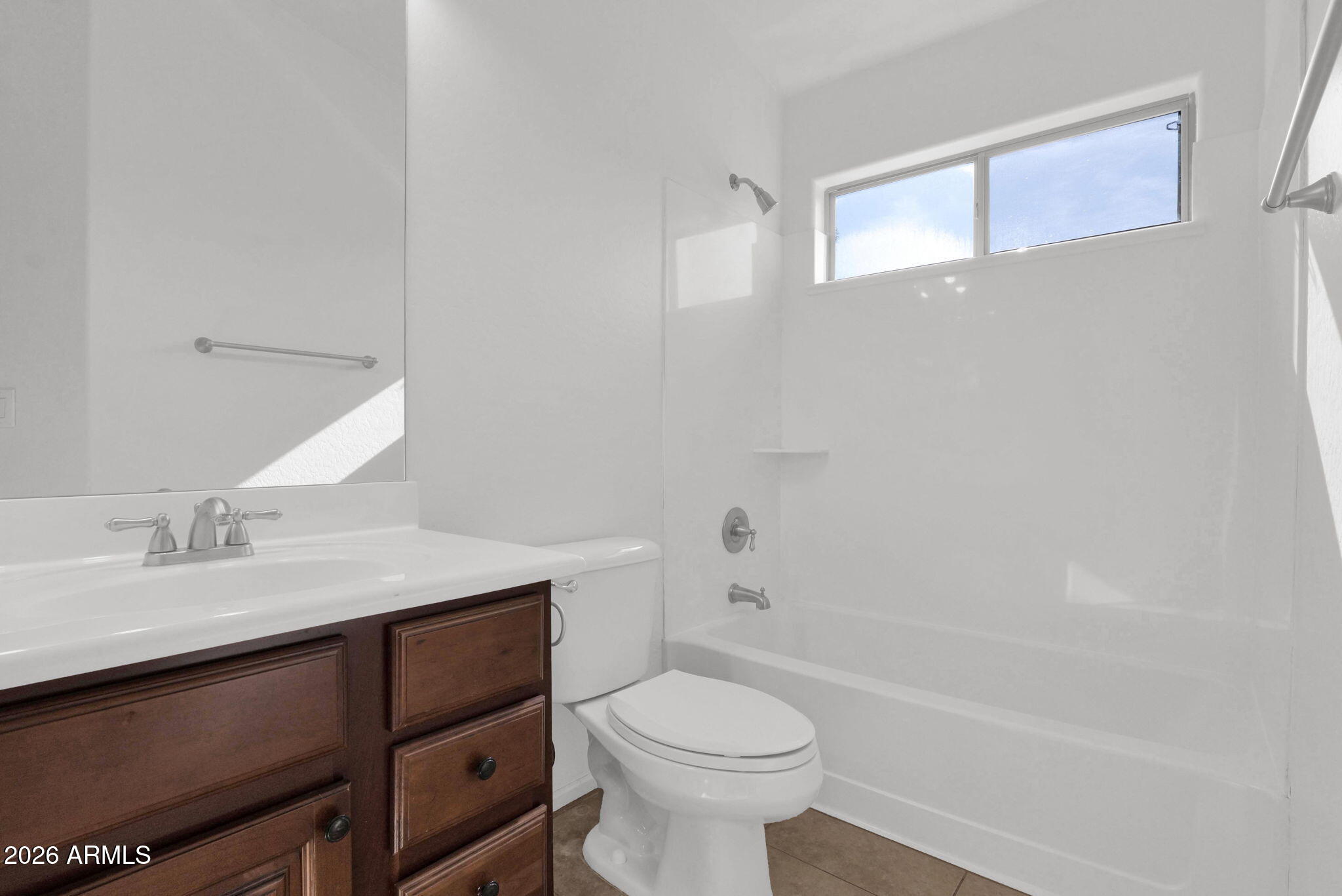 2730 East Dry Wood Road Phoenix, AZ 85024 - Photo 21 of 33 a bathroom with a sink a toilet and shower
