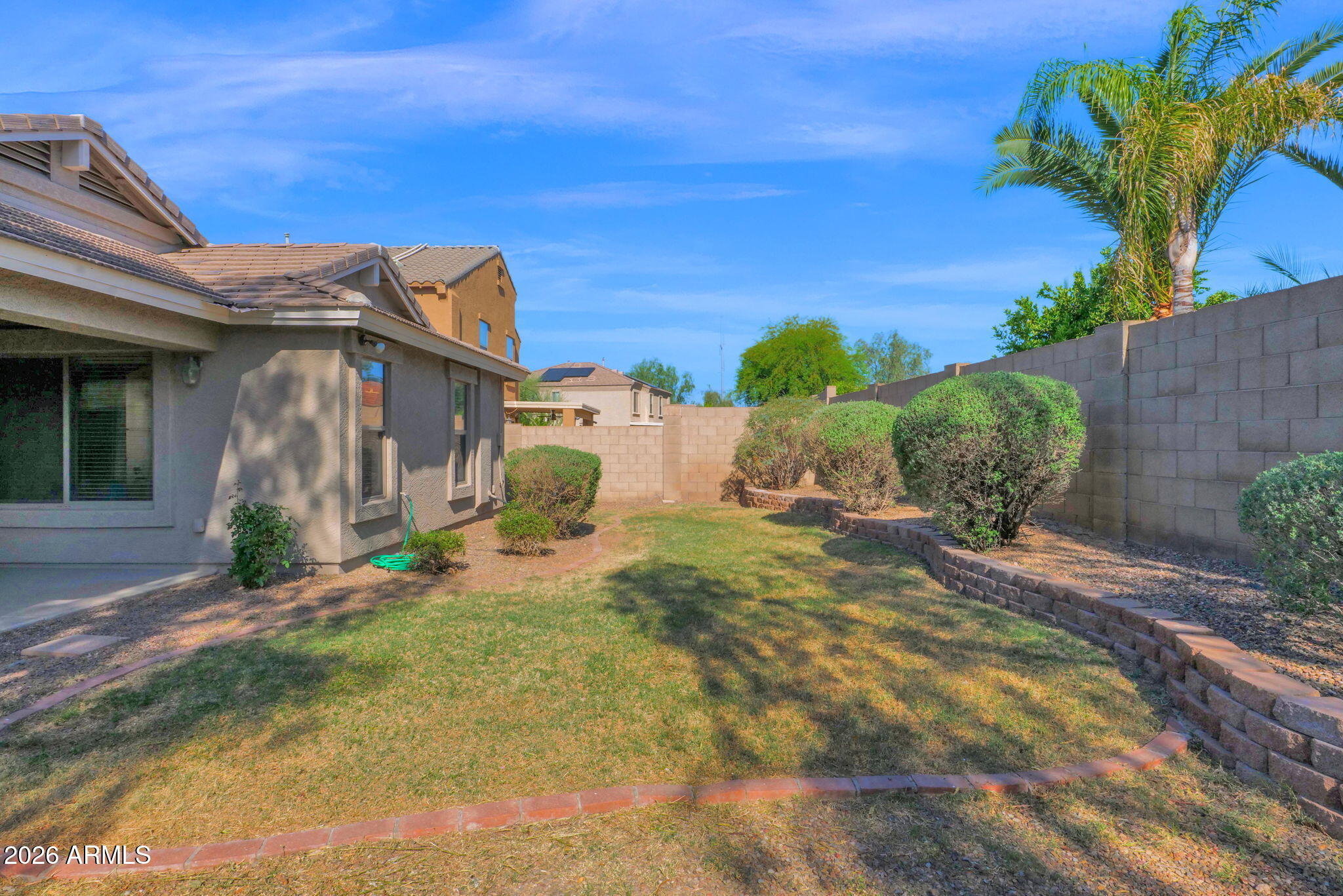 2730 East Dry Wood Road Phoenix, AZ 85024 - Photo 24 of 33 a view of a house with backyard and sitting area