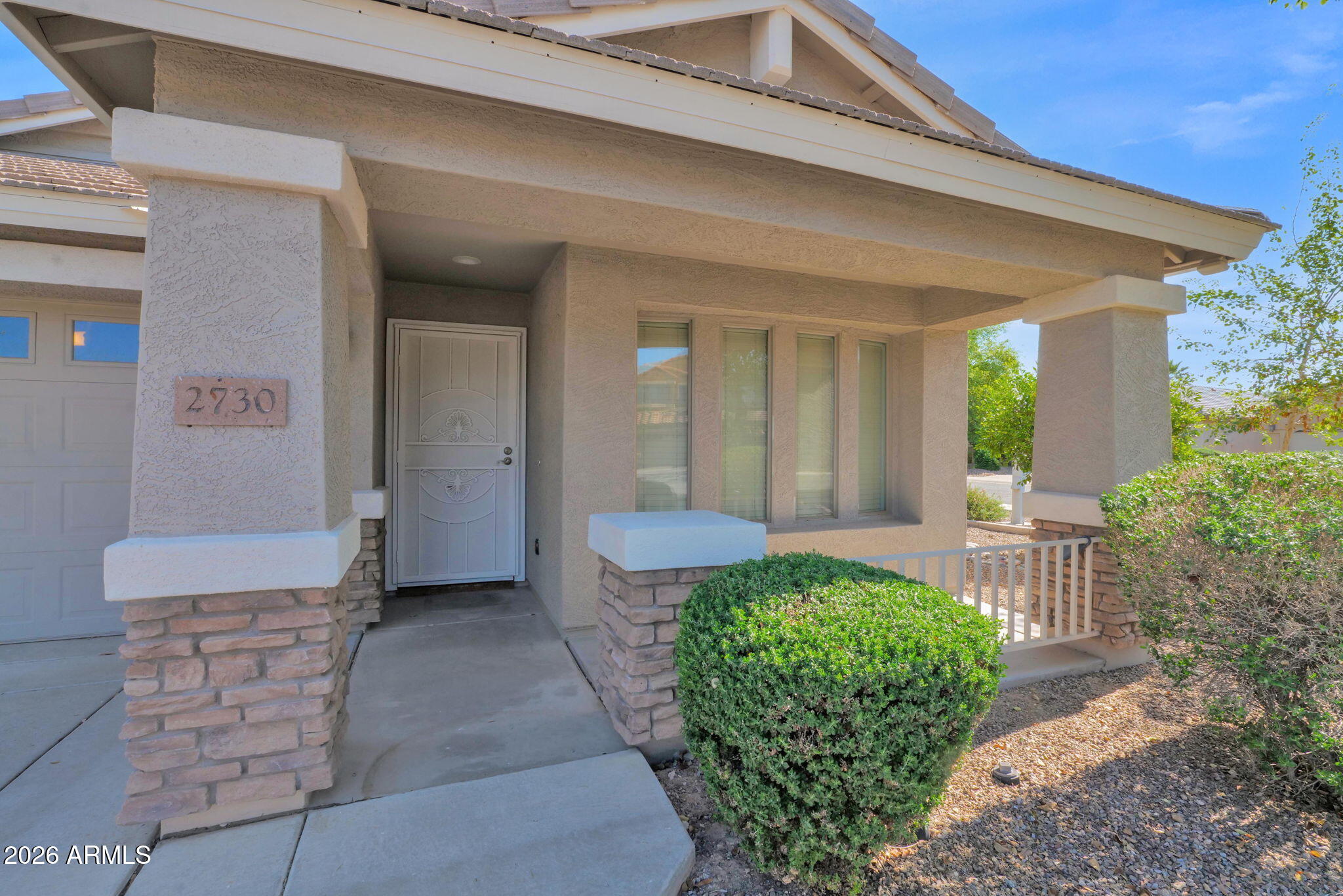 2730 East Dry Wood Road Phoenix, AZ 85024 - Photo 31 of 33 a view of a patio with table and chairs and potted plants
