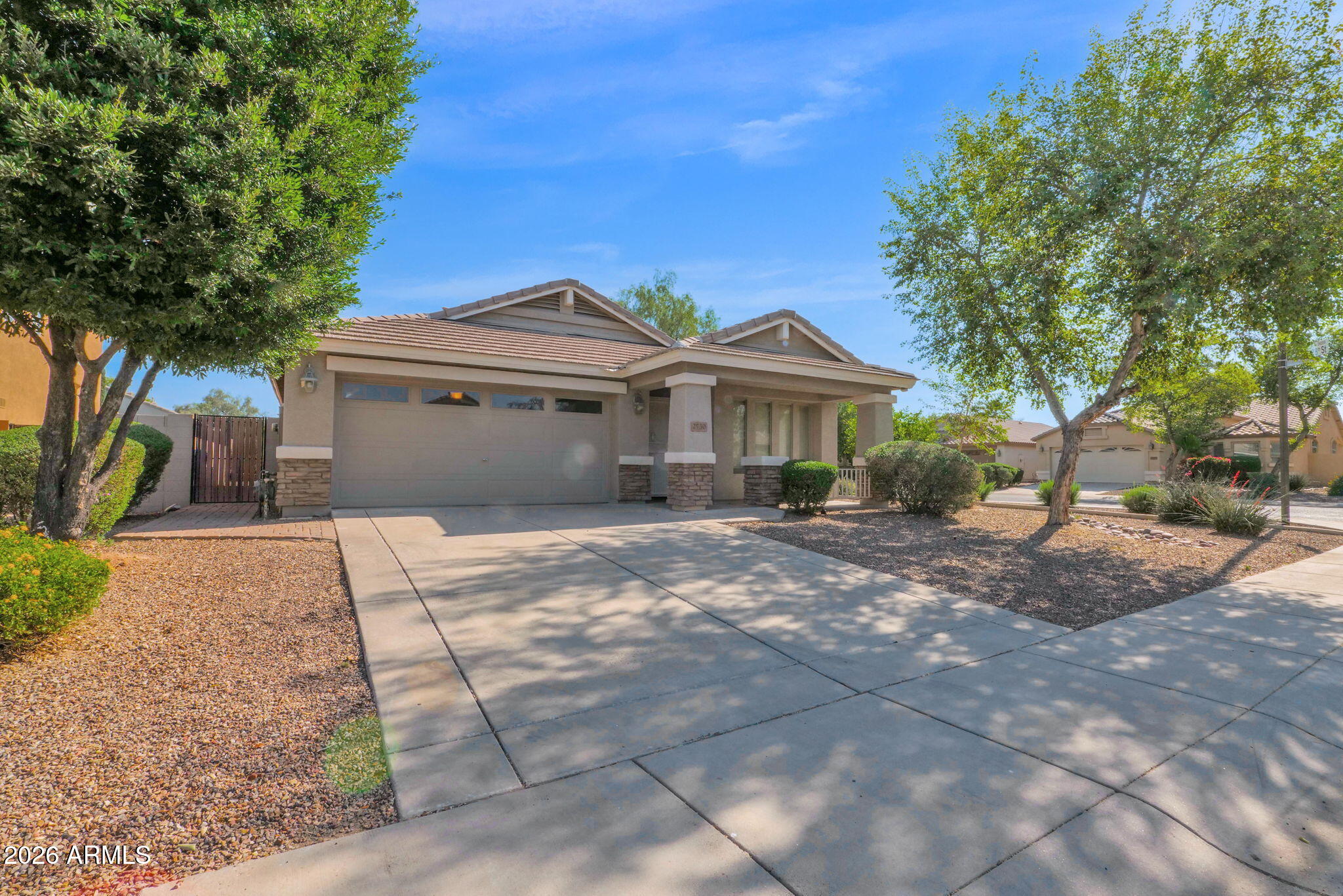 2730 East Dry Wood Road Phoenix, AZ 85024 - Photo 33 of 33 a front view of a house with yard and trees