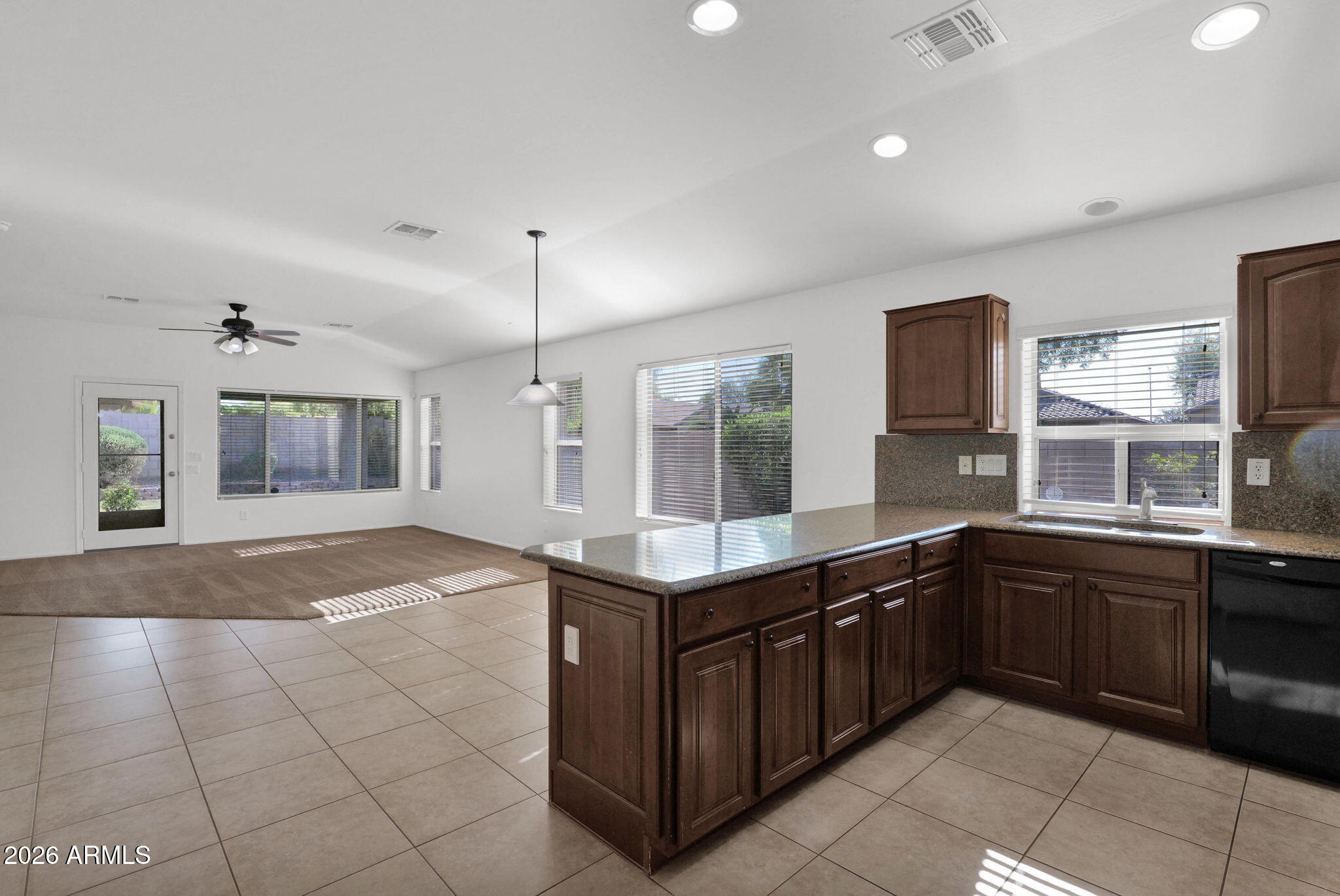 2730 East Dry Wood Road Phoenix, AZ 85024 - Photo 4 of 33 a kitchen with a sink and cabinets