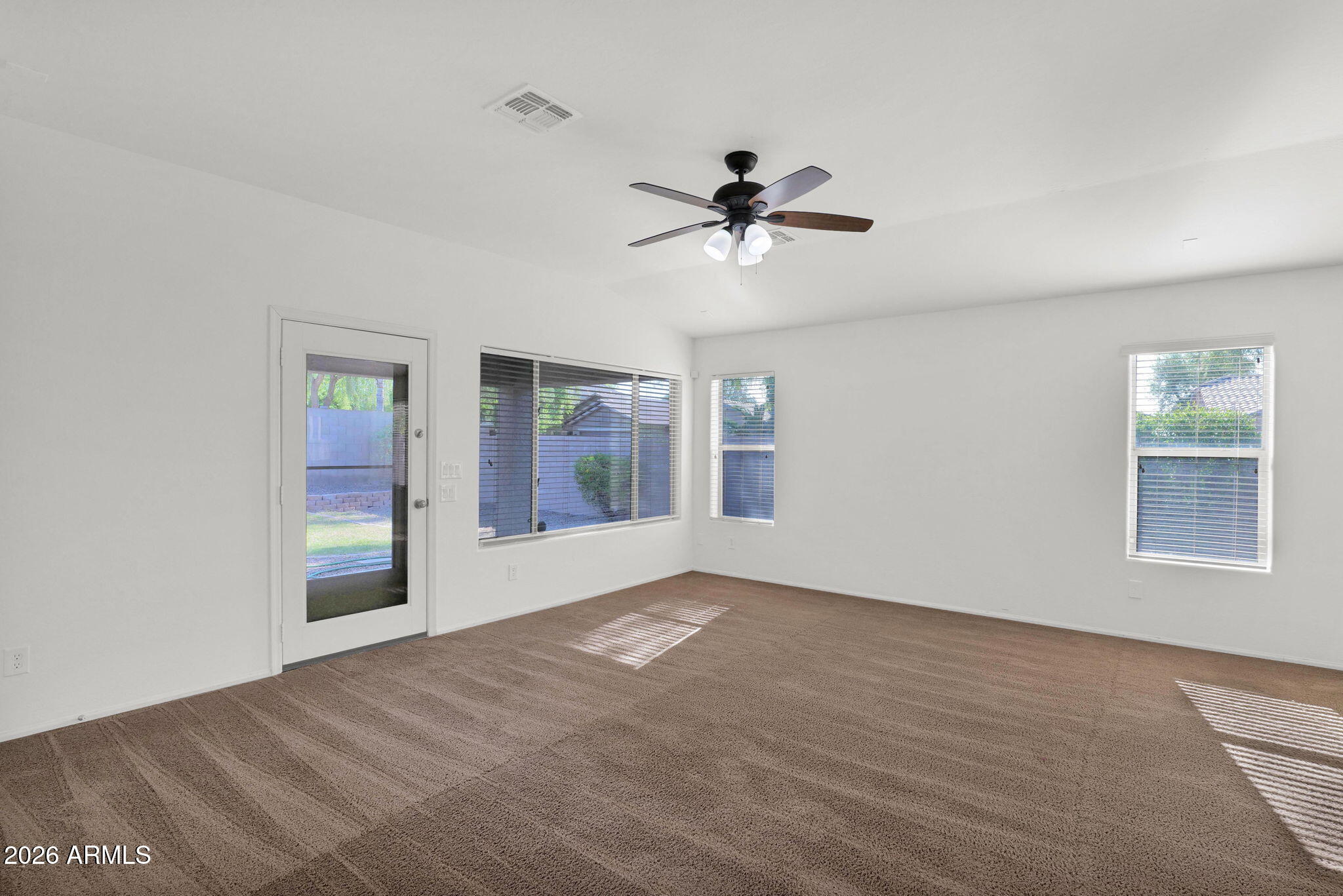 2730 East Dry Wood Road Phoenix, AZ 85024 - Photo 10 of 33 a view of empty room with windows