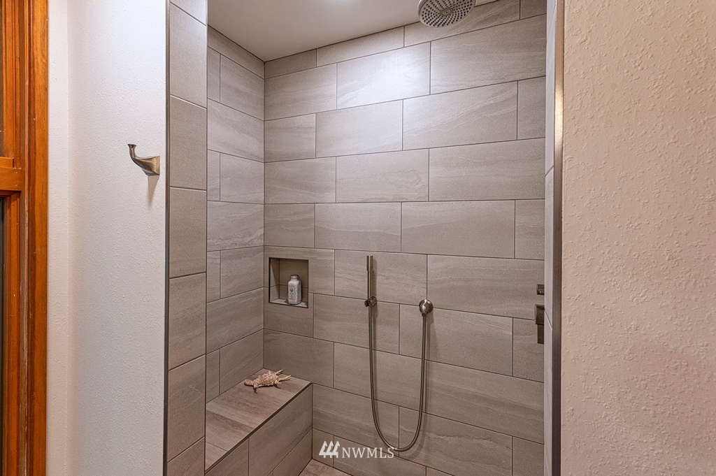 19038 Ridge Road Southwest Vashon, WA 98070 - Photo 11 of 38 a bathroom with a shower