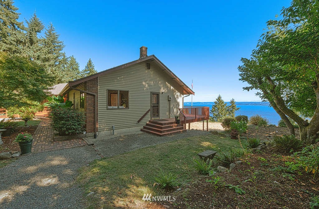 19038 Ridge Road Southwest Vashon, WA 98070 - Photo 34 of 38 a view of a house with a yard