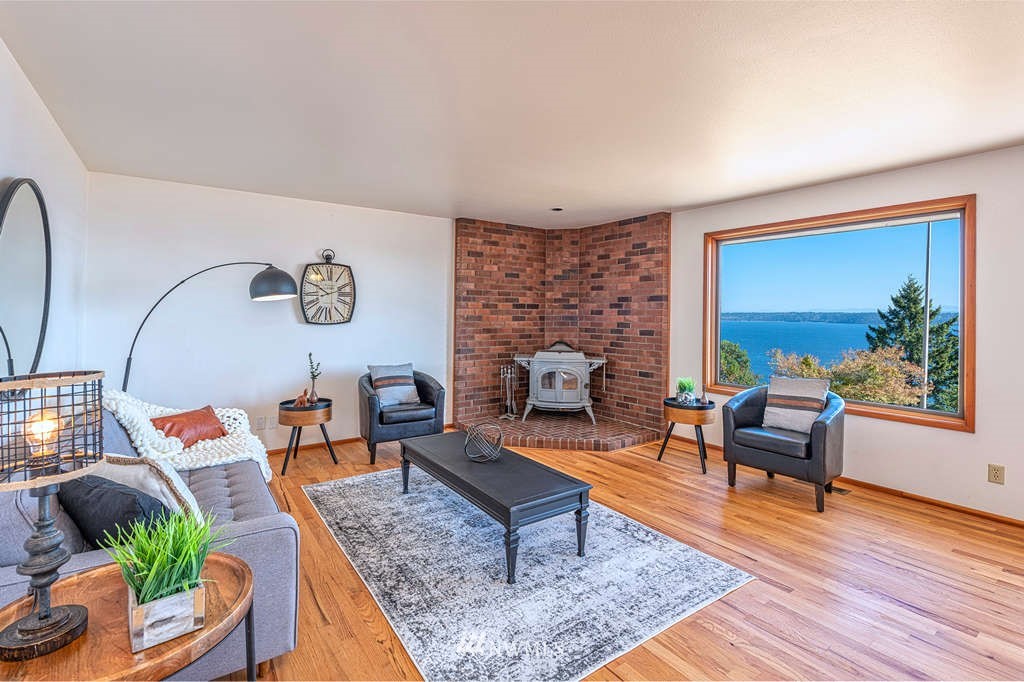 19038 Ridge Road Southwest Vashon, WA 98070 - Photo 5 of 38 a living room with furniture and wooden floor