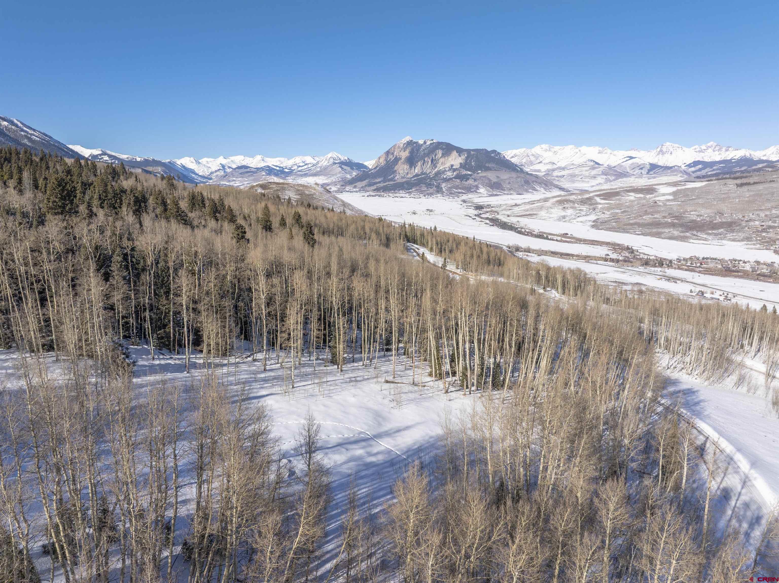 2234 Red Mountain Ranch Road Crested Butte, CO 81224 - Photo 2 of 27 a view of a yard with wooden fence