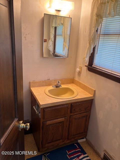178 Garfield Avenue Island Heights, NJ 08732 - Photo 11 of 21 a bathroom with a sink and a mirror