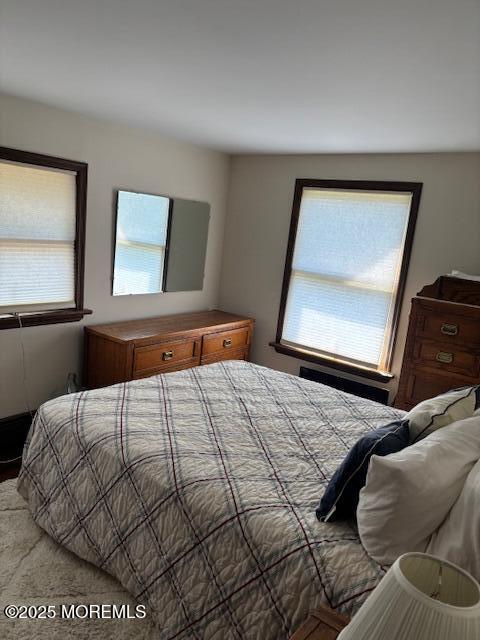 178 Garfield Avenue Island Heights, NJ 08732 - Photo 14 of 21 a bedroom with a bed and window