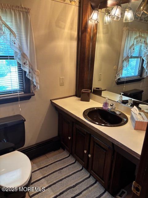 178 Garfield Avenue Island Heights, NJ 08732 - Photo 16 of 21 a bathroom with a sink a toilet and mirror