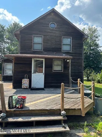 a front view of a house with yard