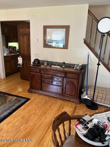 a room with a bed and furniture