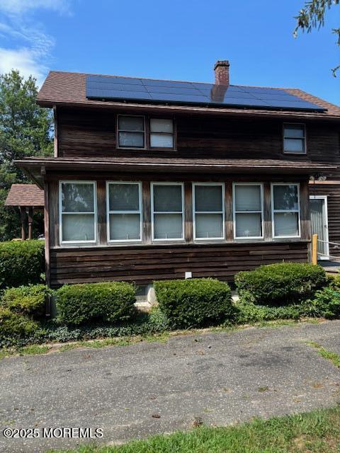178 Garfield Avenue Island Heights, NJ 08732 - Photo 8 of 21 a front view of a house with a garden