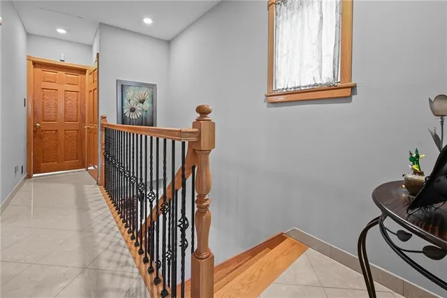 a view of a hallway with windows