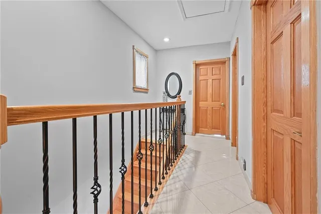 a view of a hallway with windows