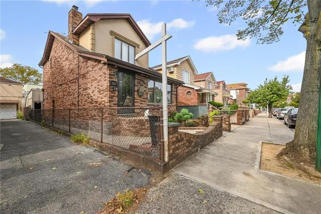 a view of a street in front of house