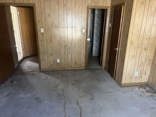 an empty room with windows