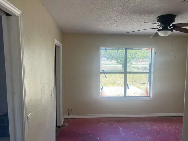 an empty room with a window