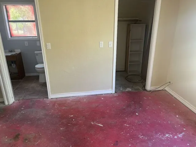 an empty room with windows