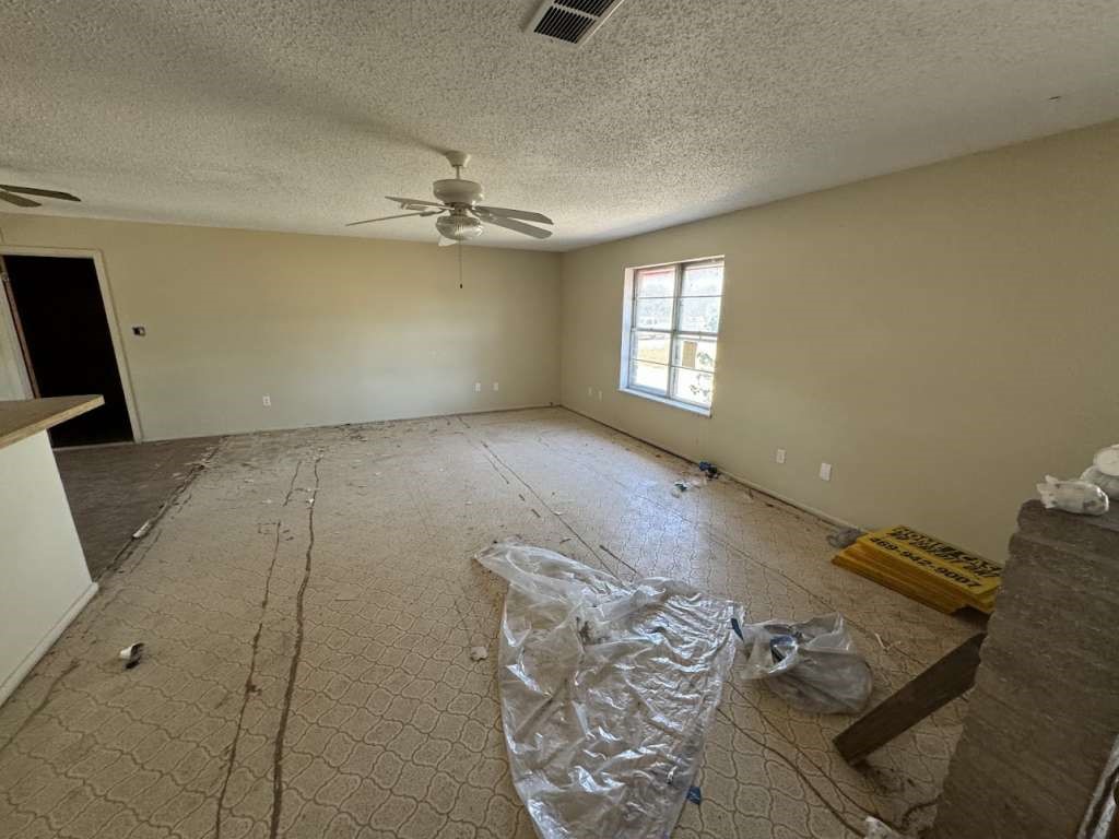 5996 Yucca Trail Beeville, TX 78102 - Photo 5 of 20 a view of a livingroom with a dishwasher furniture