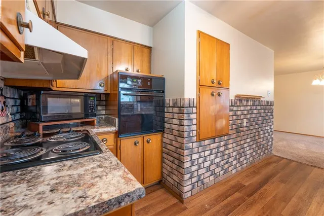 a view of barbecue area with wooden floor