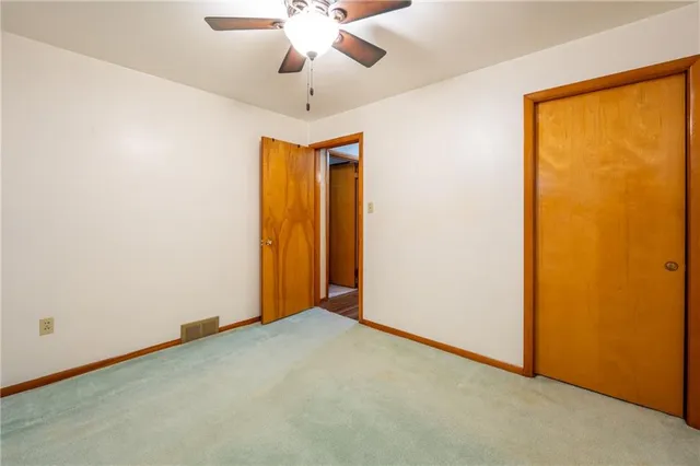 an empty room with a large window