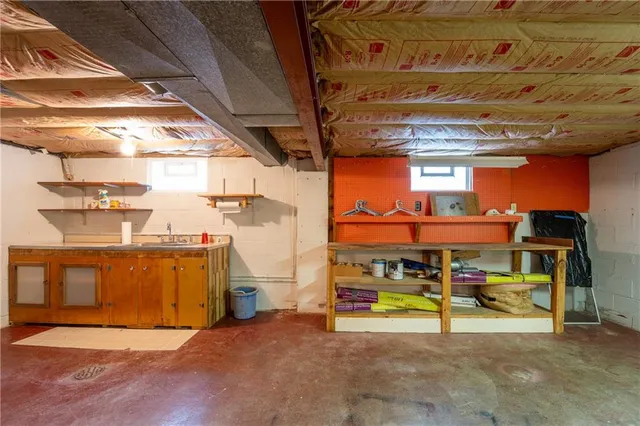 a view of a building with a table and chairs