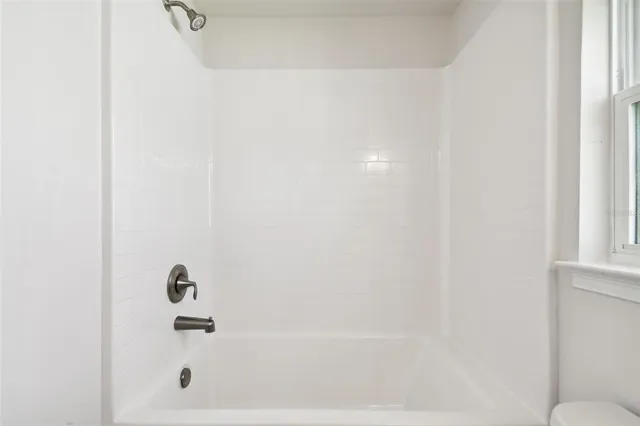 an empty room with window