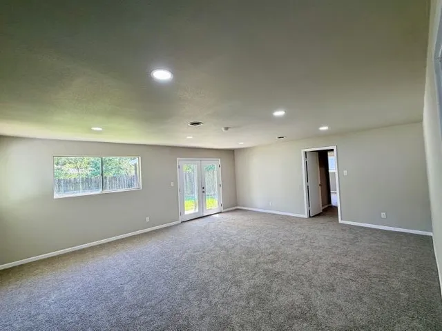 an empty room with windows