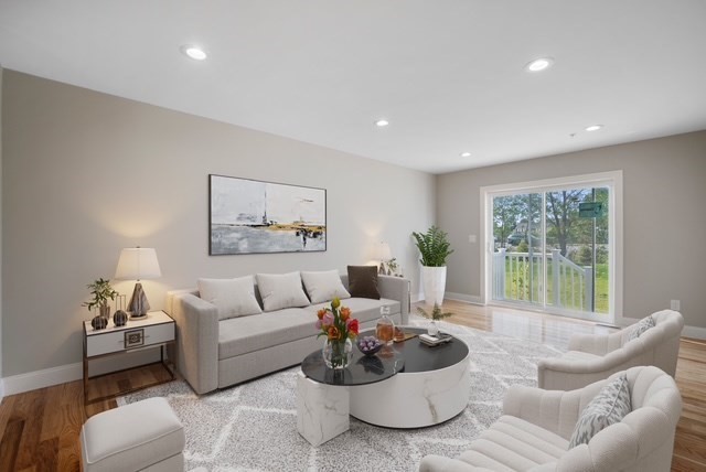 4 Sabrina Way, Unit G Feeding Hills, MA 01030 - Photo 8 of 16 a living room with furniture and a large window
