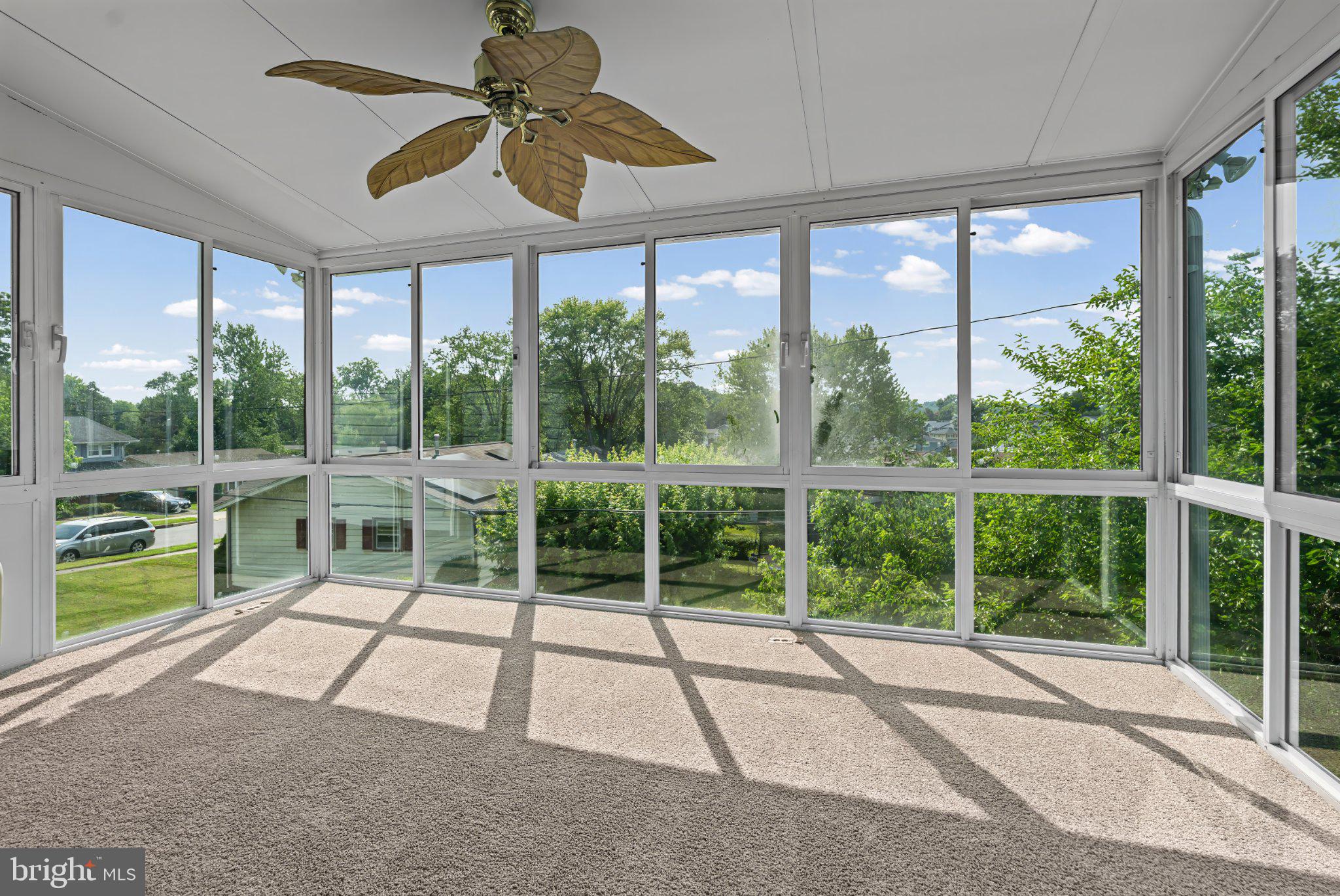 1317 Roxboro Road Baltimore, MD 21237 - Photo 9 of 30 Bright sunroom with scenic views.