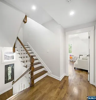 a bedroom with bed and a window