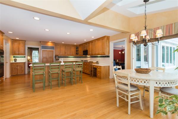 123 High Ridge Road Boxford, MA 01921 - Photo 10 of 29 a dining table with chairs and kitchen view