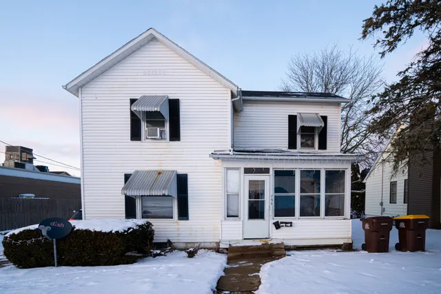 a view of a house with a patio