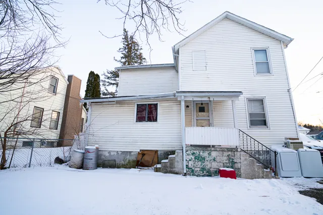 a view of a house with a patio