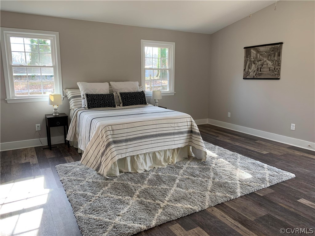 12518 South Chester Road Chester, VA 23831 - Photo 13 of 27 a bedroom with a bed and window
