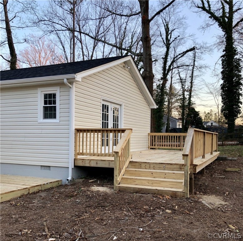12518 South Chester Road Chester, VA 23831 - Photo 22 of 27 a view of a house with a wooden fence