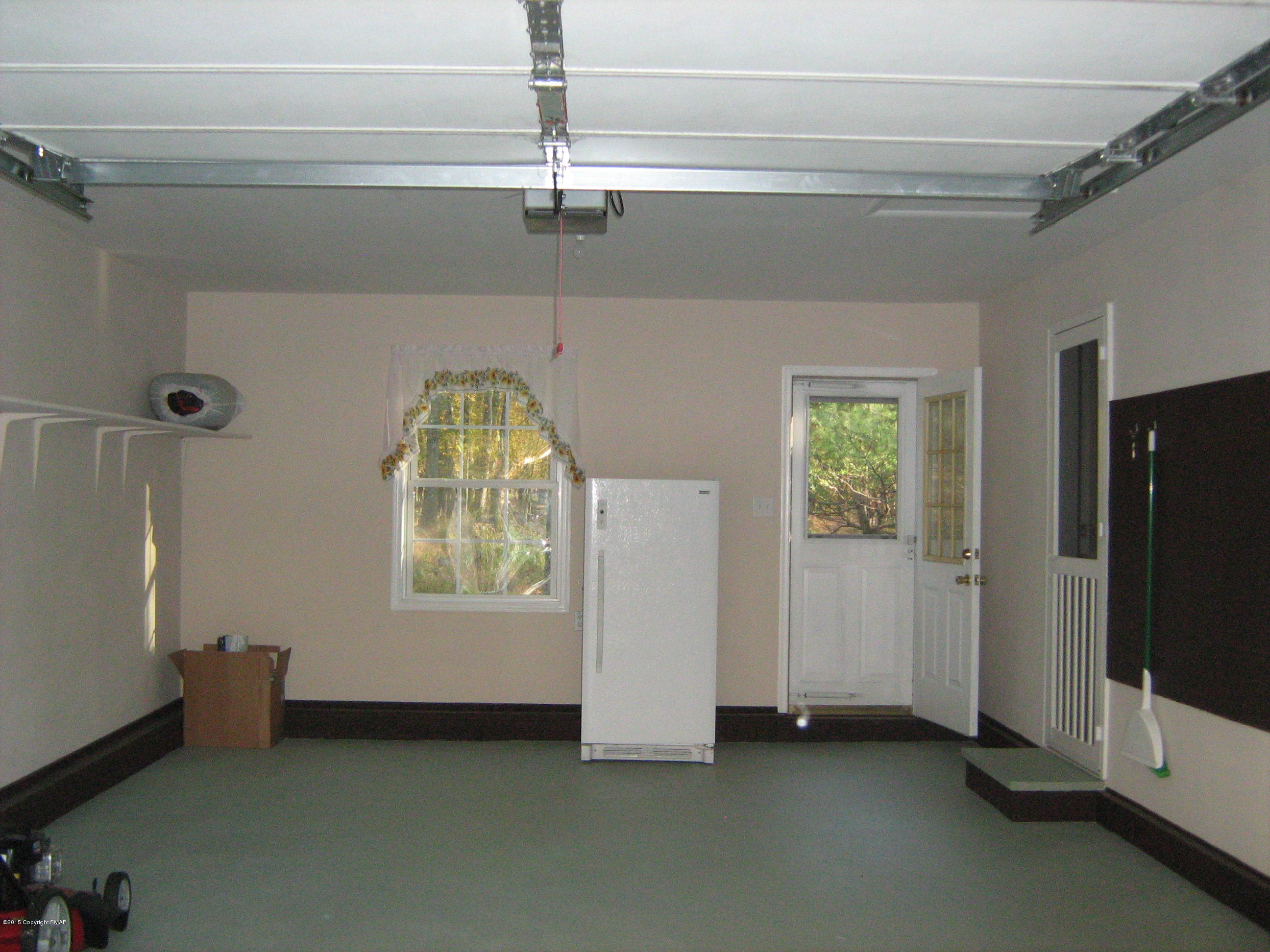 118 Bromley Road Henryville, PA 18332 - Photo 25 of 37 a view of empty room with window and fireplace