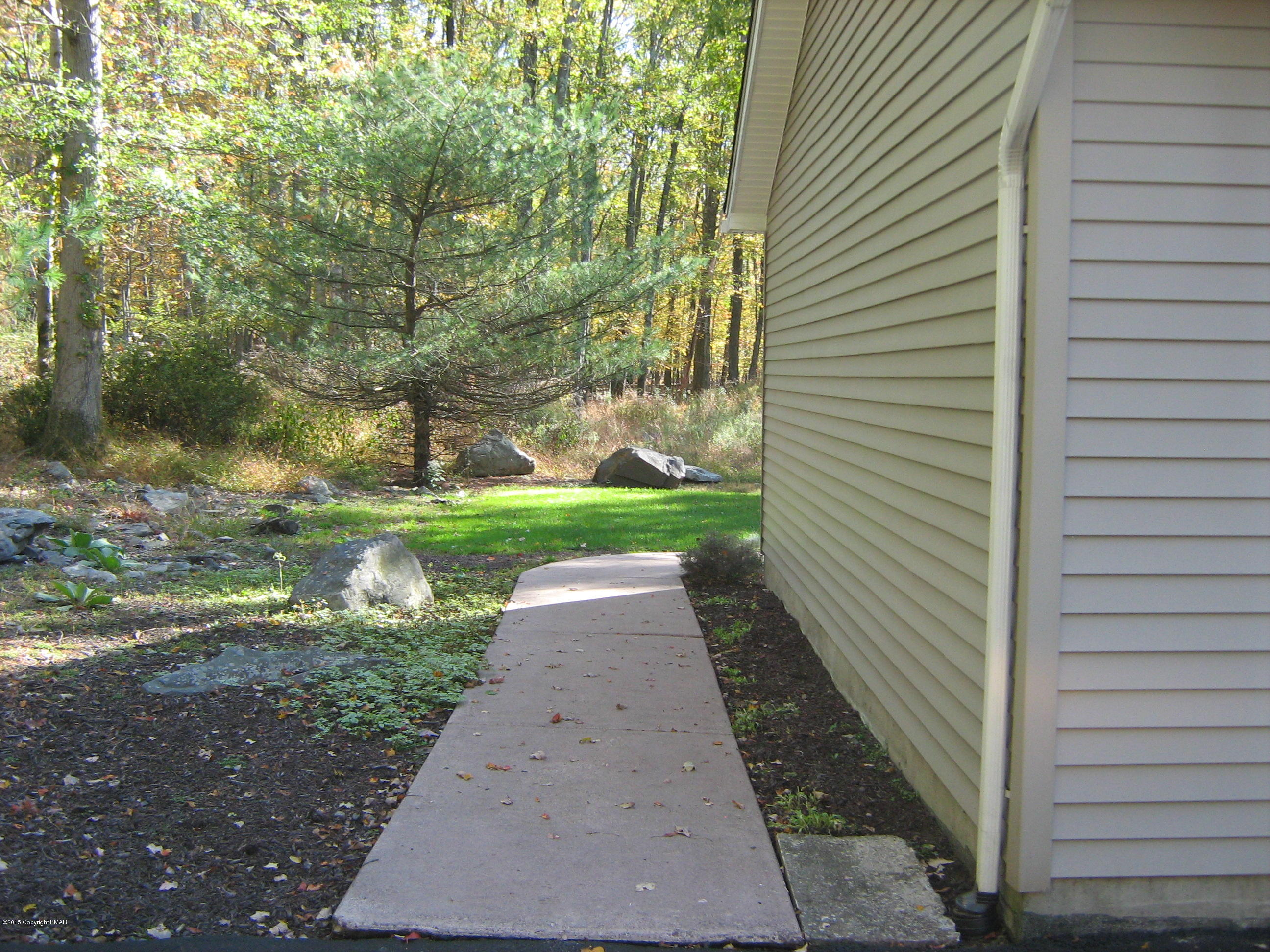 118 Bromley Road Henryville, PA 18332 - Photo 31 of 37 a view of a pathway with a yard