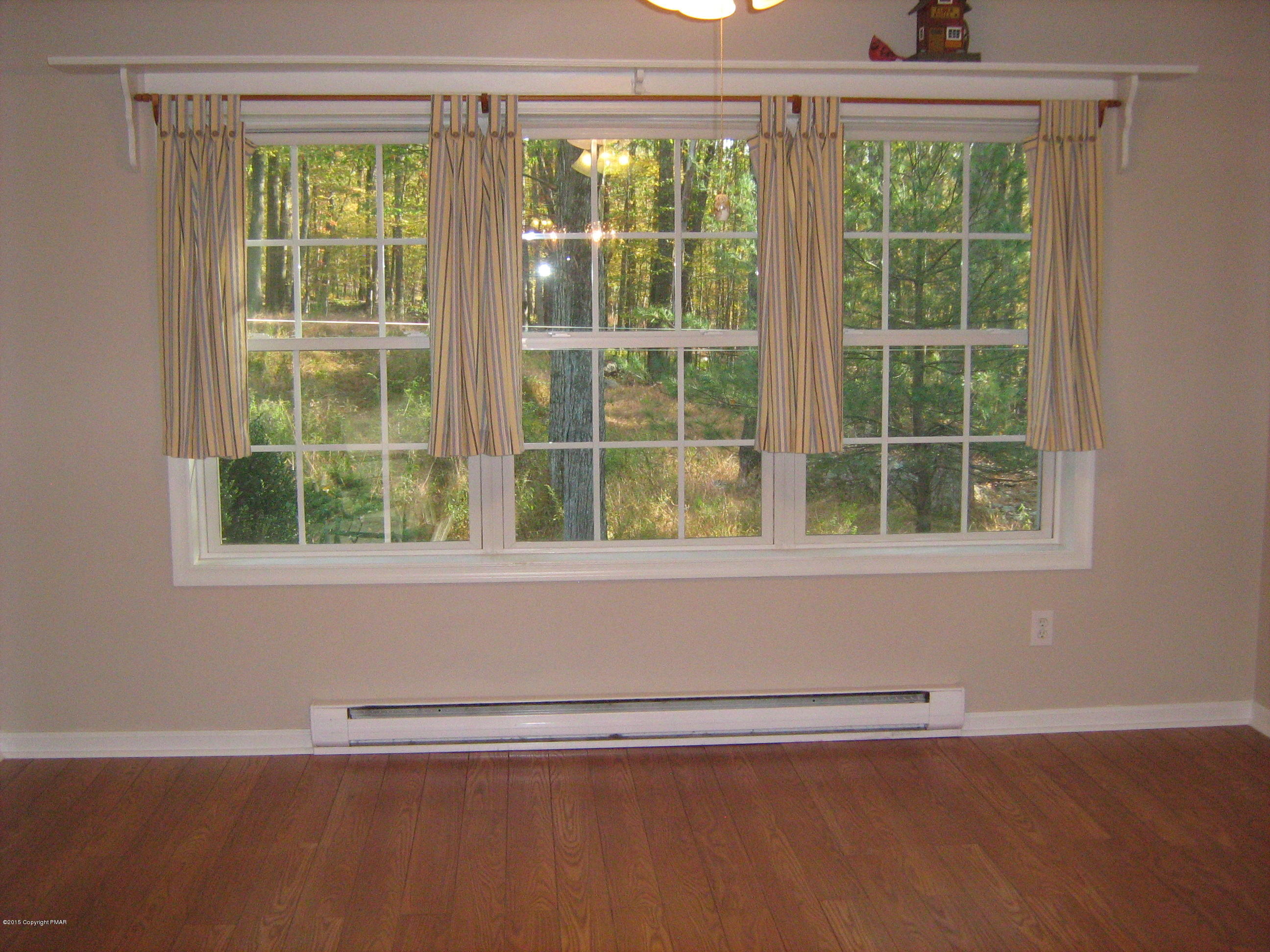 118 Bromley Road Henryville, PA 18332 - Photo 8 of 37 a view of a room that has a window